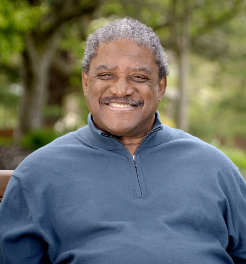Man standing outside, smiling